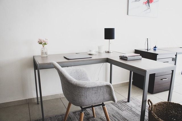 smart home devices on desk with laptop showing settings and privacy controls